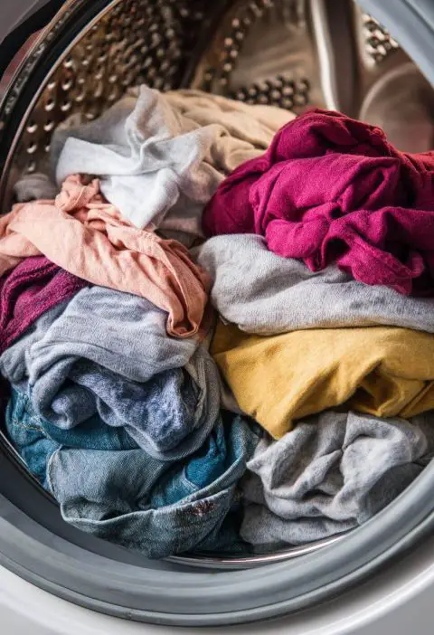 15 Laundry Mistakes That Are Ruining Your Clothes — And How to Quit ‘Em for Good