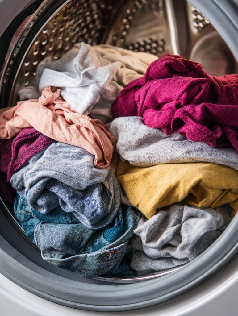 15 Laundry Mistakes That Are Ruining Your Clothes — And How to Quit ‘Em for Good