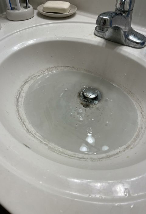 When Your Bathroom Sink Drains at a Snail’s Pace (and the Plumber’s Nowhere to Be Found)