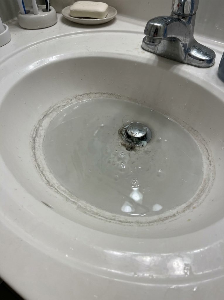When Your Bathroom Sink Drains at a Snail’s Pace (and the Plumber’s Nowhere to Be Found)