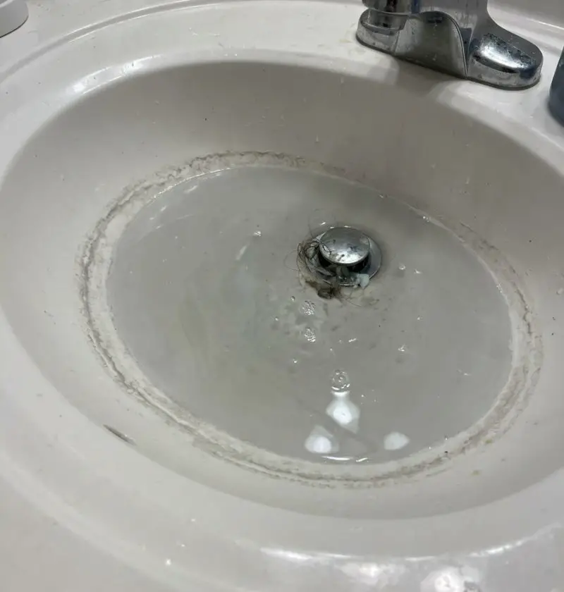 When Your Bathroom Sink Drains at a Snail’s Pace (and the Plumber’s Nowhere to Be Found)