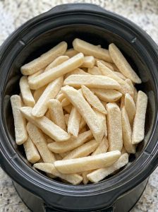 4-Ingredient Slow Cooker Cheesy Onion Fries