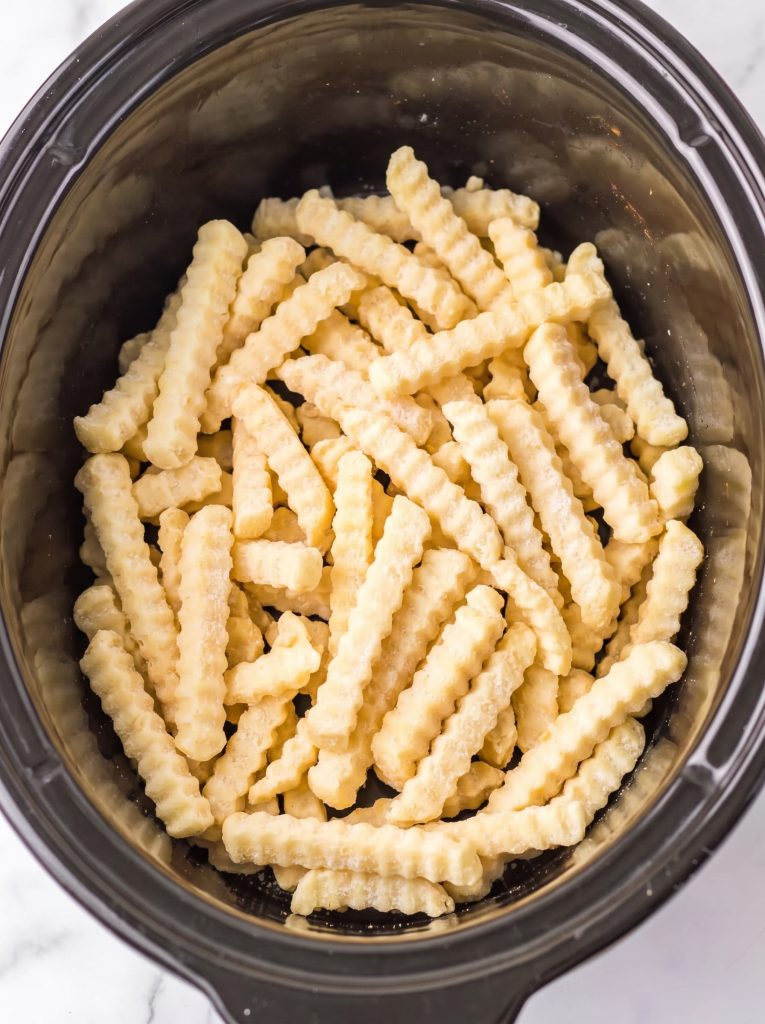 4-Ingredient Slow Cooker Cheesy Onion Fries