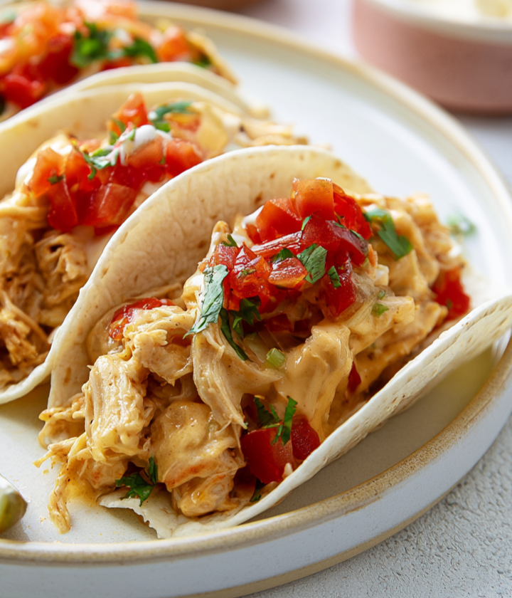 Slow Cooker Queso Chicken Tacos