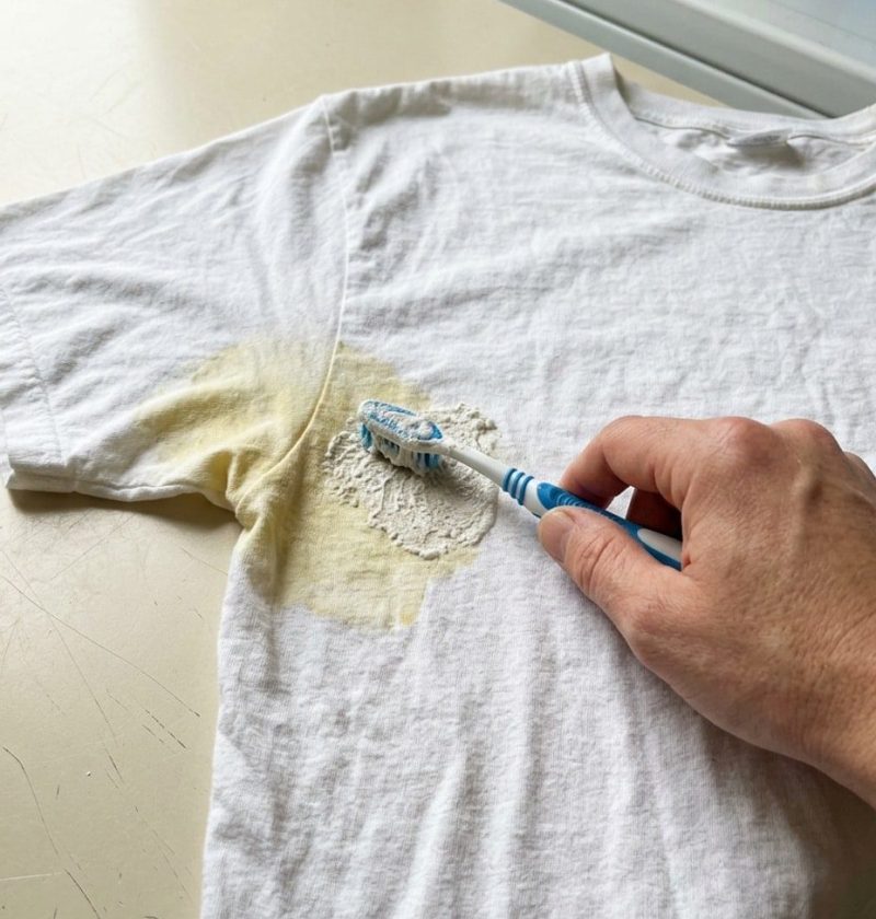Treating a yellow sweat stain on a white shirt