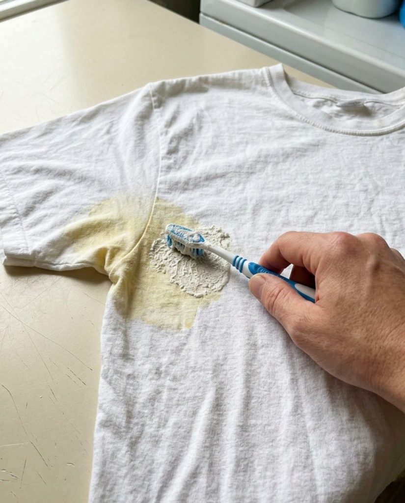 Treating a yellow sweat stain on a white shirt