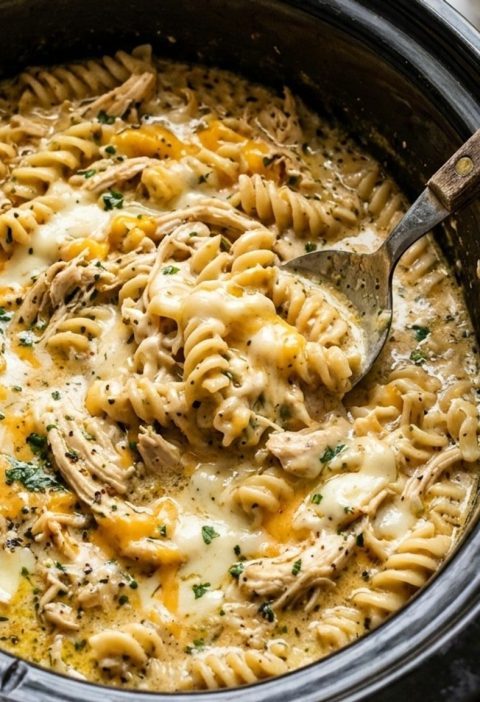 Stirring cheese into a slow cooker