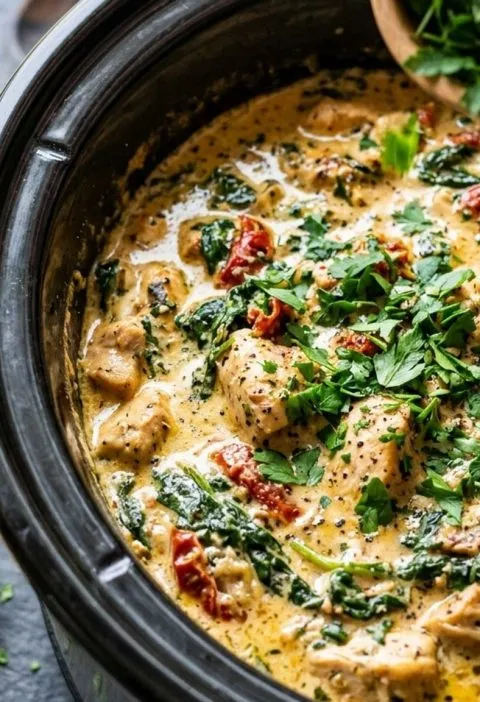 Finishing a slow cooker dish with herbs